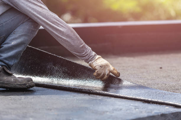 Professional Emergency Waterproofing technician working in Random Lake, WI